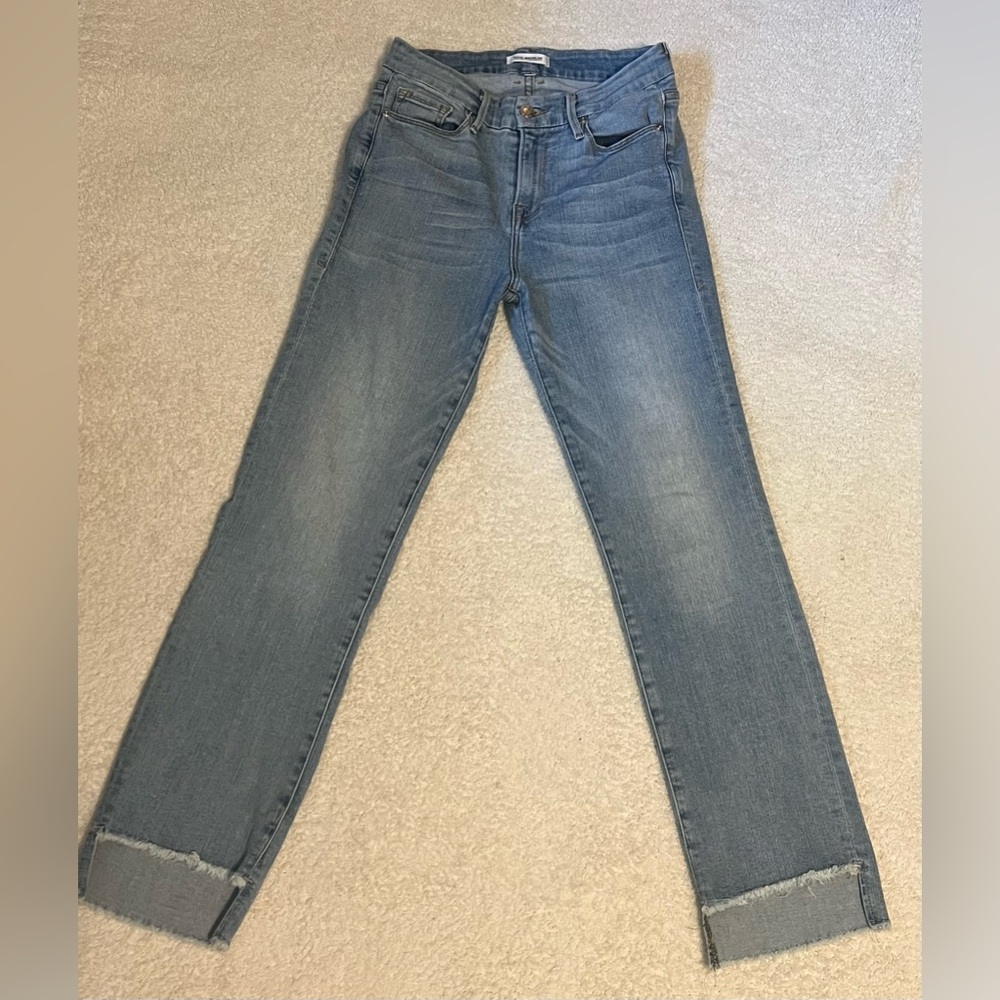 Good American Straight Leg Jeans with a unique notched, raw hem design